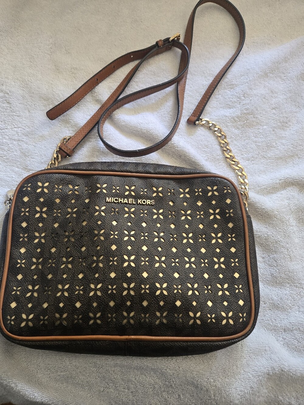 Michael Kors Black Crossbody with Gold Perforated Accents and Brown Trim